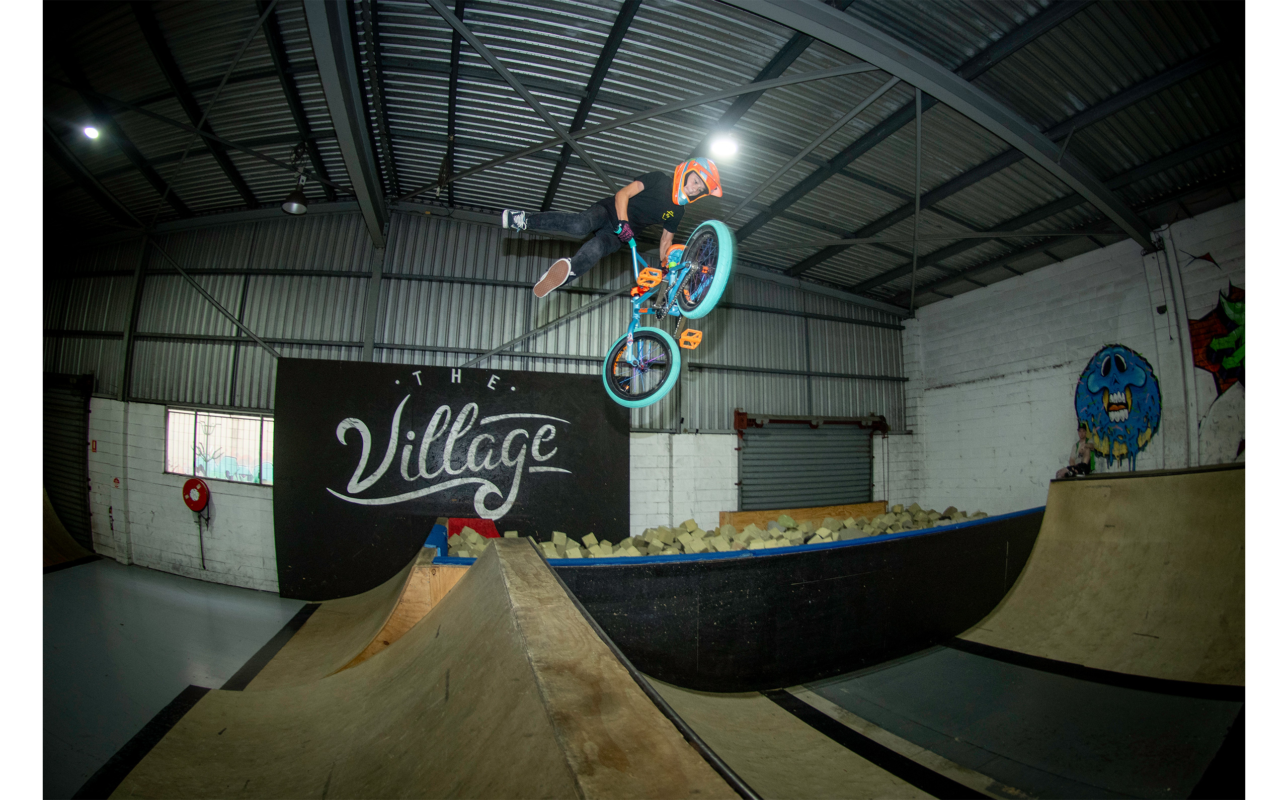 Emlio Martin does a 360 tailwhip over the spine at the Oceania Titles 2024 at the Village